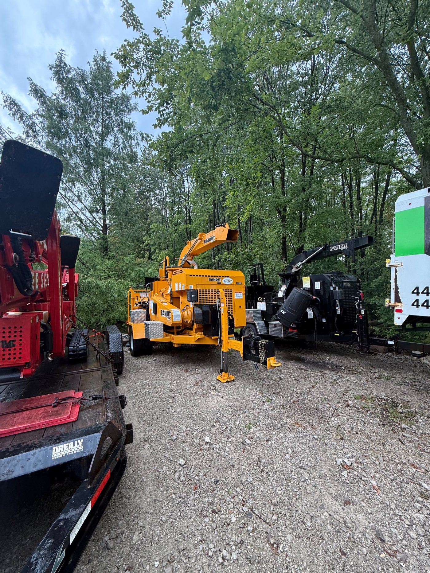 Rangel Brothers equipment yard with Bandit chippers, spider lift and chip truck Rangel Brothers equipment yard with Bandit chippers, spider lift and chip truck