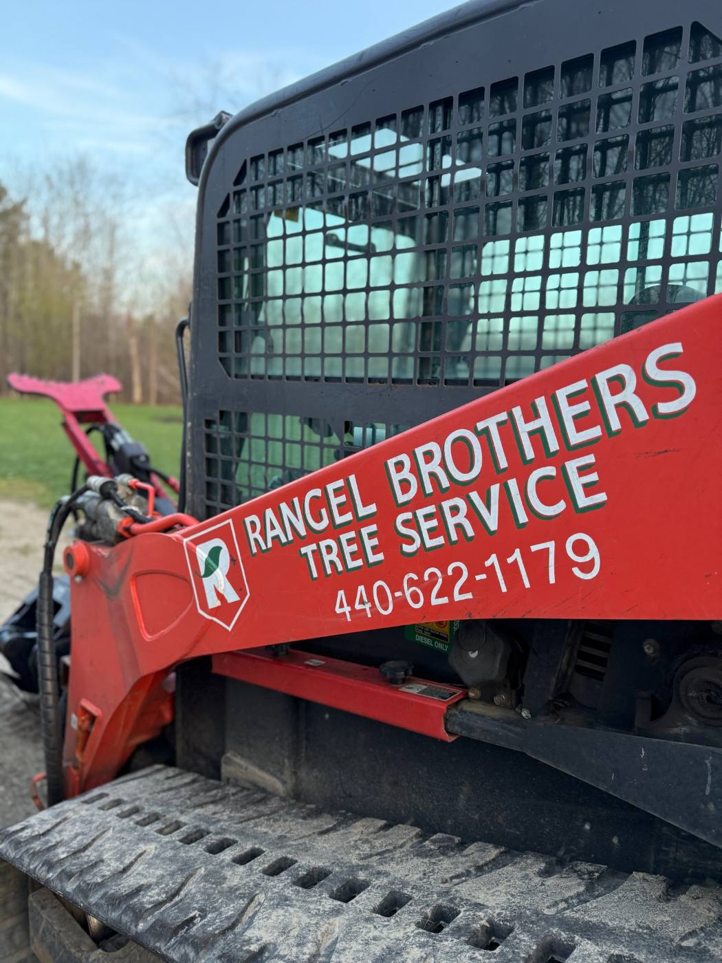 Rangel Brothers Tree Service branding on company equipment